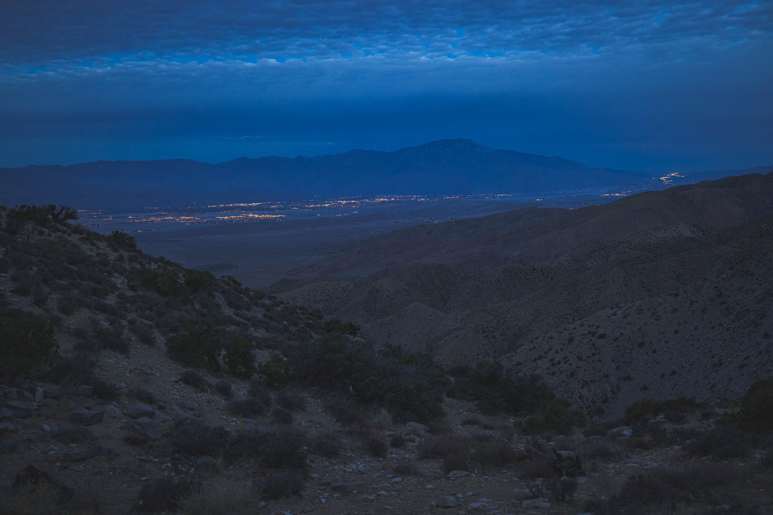 A wide angle shot of the vista from Key's View showing the lights from Palm Springs