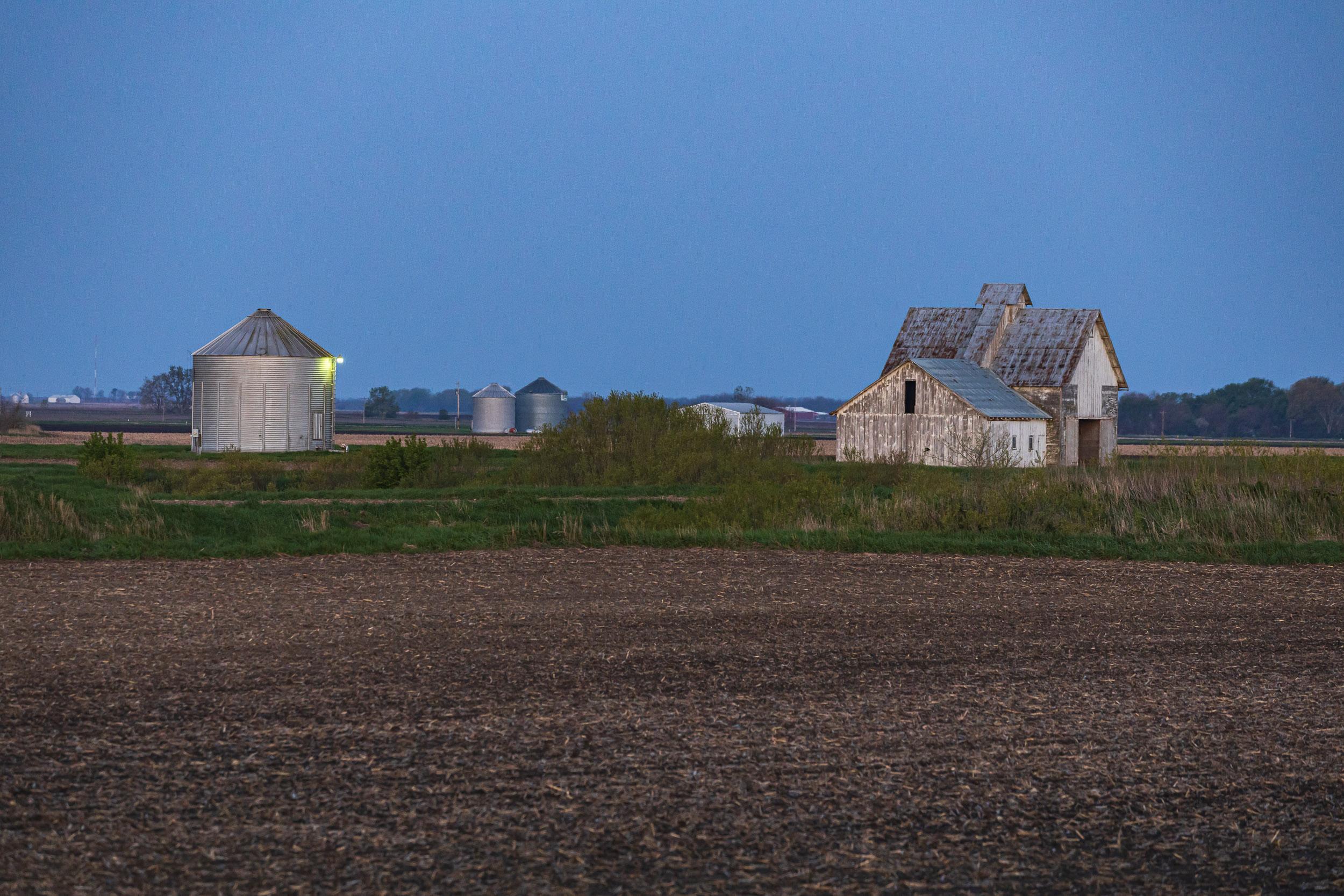 The farm buildings now lit by the morning sun