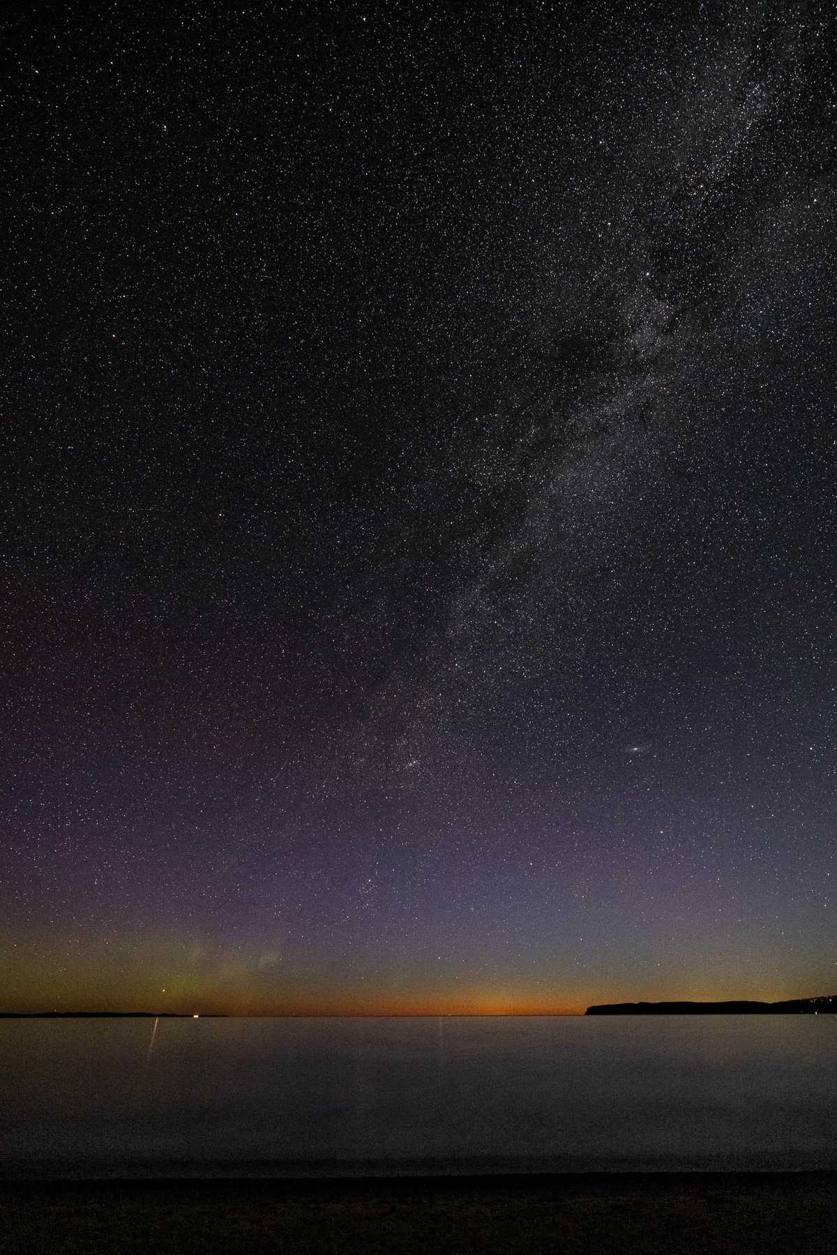 The Milky Way above some glow on the horizon