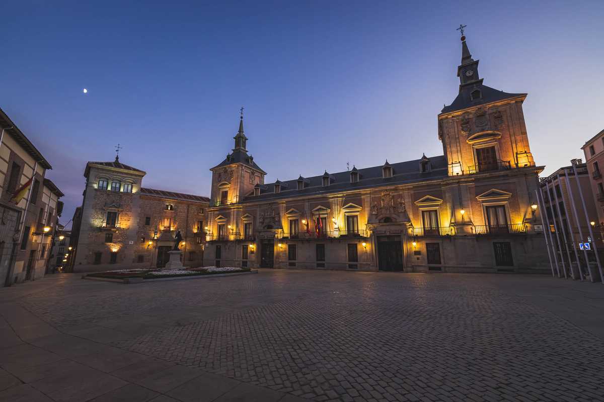 Plaza de la Villa, an old square surrounded by some of the oldest remaining buildings in the city, with the moon overhead