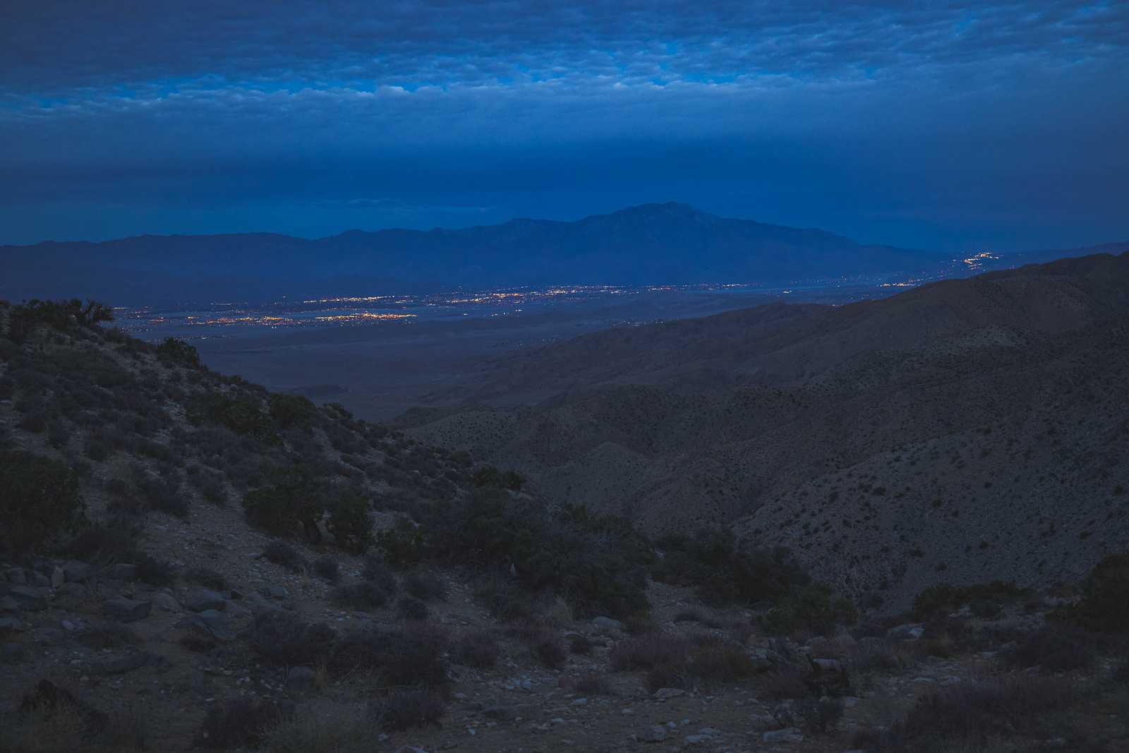 A wide angle shot of the vista from Key's View showing the lights from Palm Springs