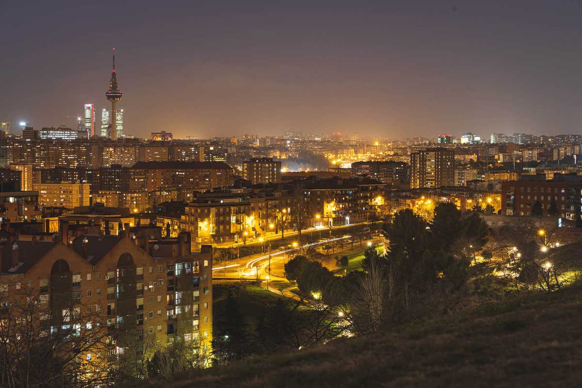 A view of Madrid at night from a hilltop