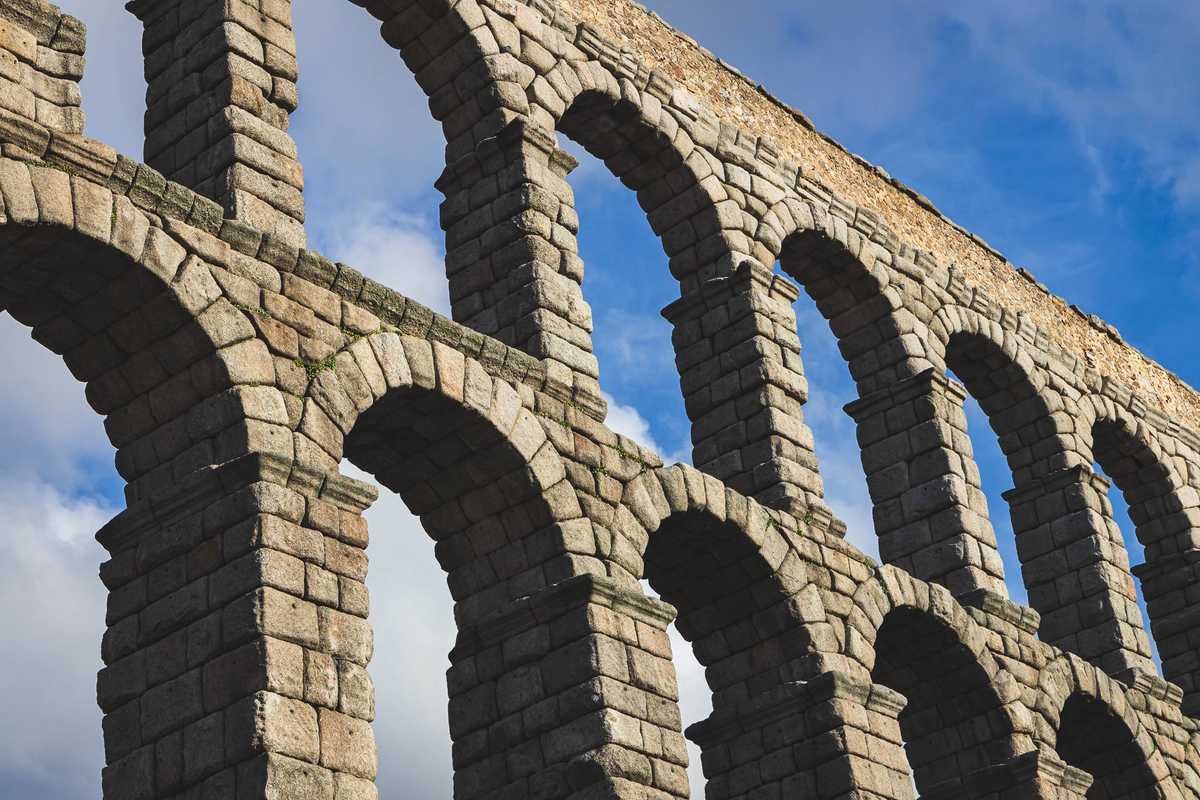 A detail shot of the restored but ancient Roman aqueduct in Segovia, Spain